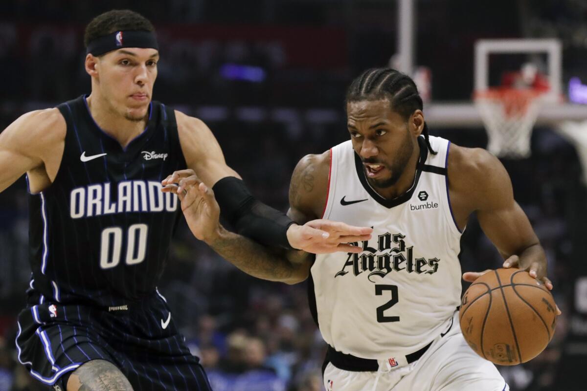 Kawhi Leonard, Paul George traveling for Clippers' road trip but
