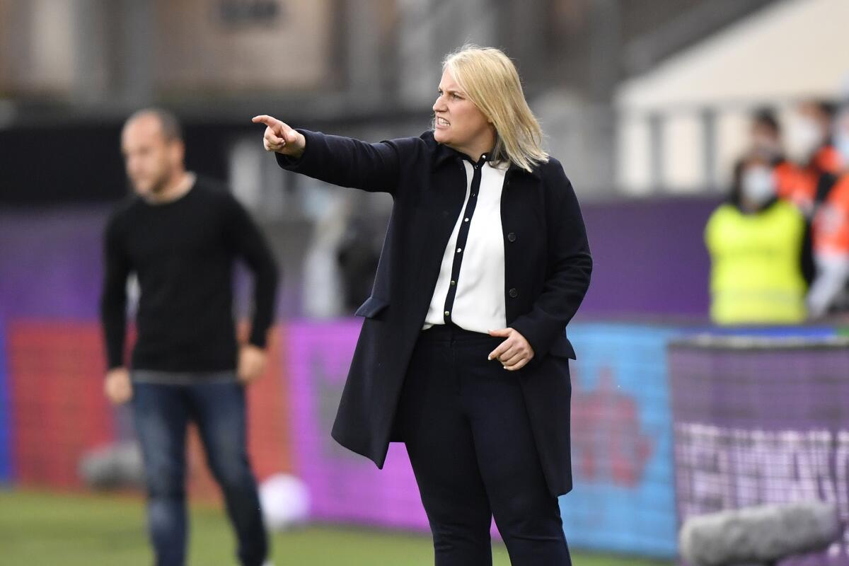 FILE - Chelsea's coach Emma Hayes gives instructions from the side line during the UEFA Women's Champions League final soccer match between Chelsea FC and FC Barcelona in Gothenburg, Sweden, on May 16, 2021. Hayes is taking time away from coaching Chelsea’s women’s team “for the foreseeable future” as she recovers after undergoing an emergency hysterectomy. In a statement she released Thursday Oct. 13, 2022, Hayes said she had the operation this month as she battles endometriosis. (AP Photo/Martin Meissner, File)