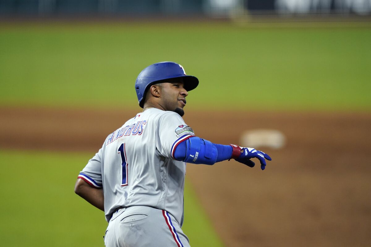 Texas Rangers' Elvis Andrus runs the bases after hitting a home run against the Houston Astros during the ninth inning of a baseball game Tuesday, Sept. 1, 2020, in Houston. (AP Photo/David J. Phillip)