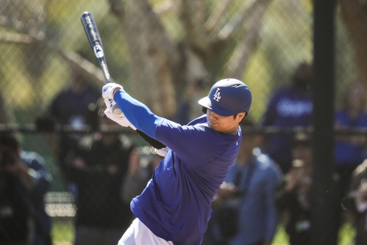 Dodgers designated hitter Shohei Ohtani participates in batting practice at Camelback Ranch on Monday.