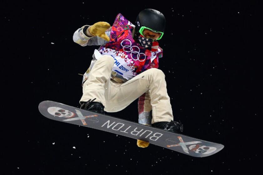 American Shaun White trains on the snowboard halfpipe in preparation for Tuesday's event at Rosa Khutor Extreme Park at the 2014 Sochi Winter Olympic Games.