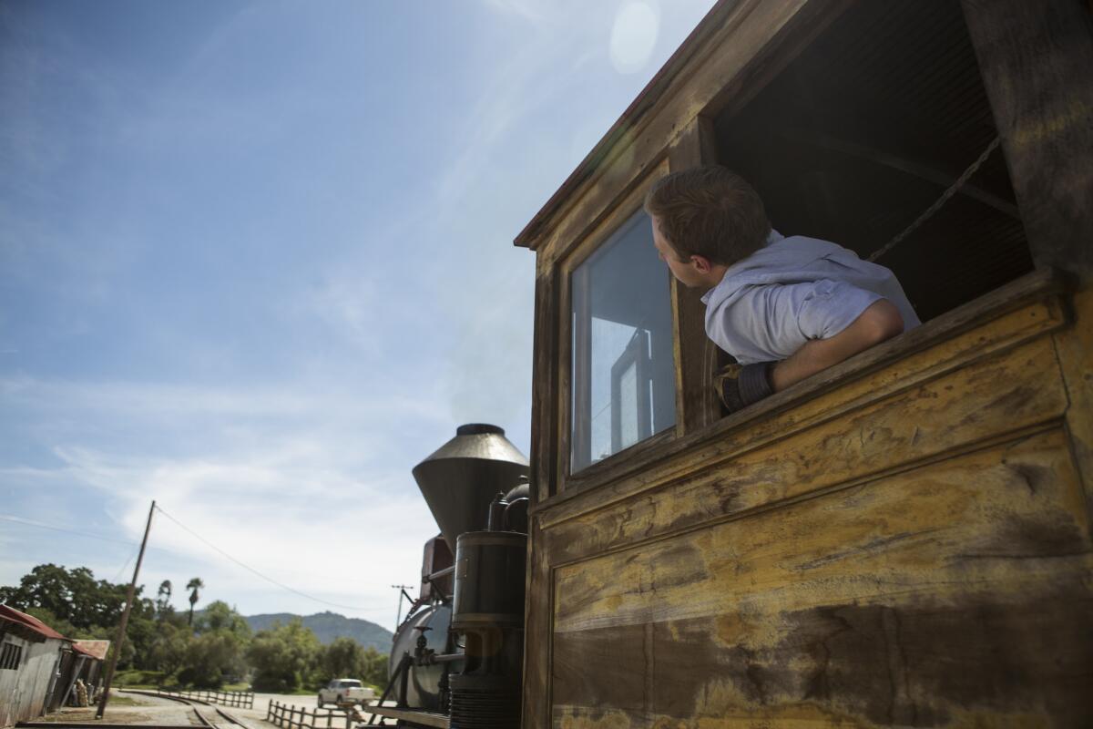 Fireman Bobby Goldie rides in the train's locomotive.