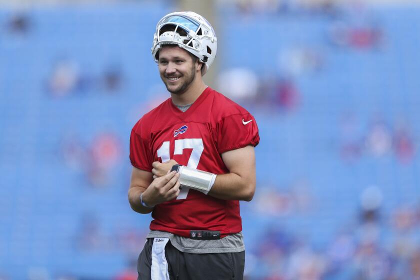 Buffalo Bills quarterback Josh Allen smiles during practice at training camp in Orchard Park, N.Y., on July 31, 2021.