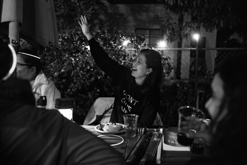 Jean Chen Ho raises her arm