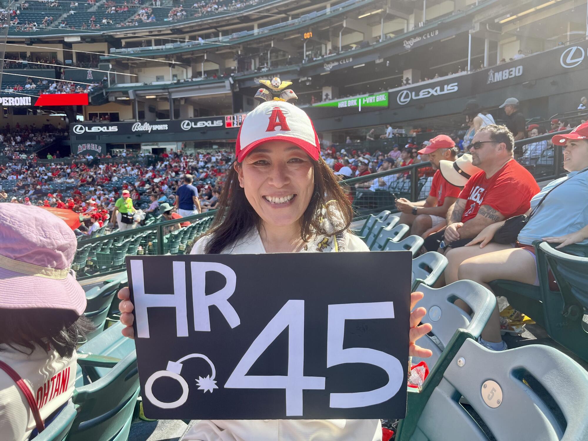 Yuka Yonetani, a Shohei Ohtani fan from Japan, sits in the stands at Angel Stadium during an Angels-Orioles game on Sept. 10.