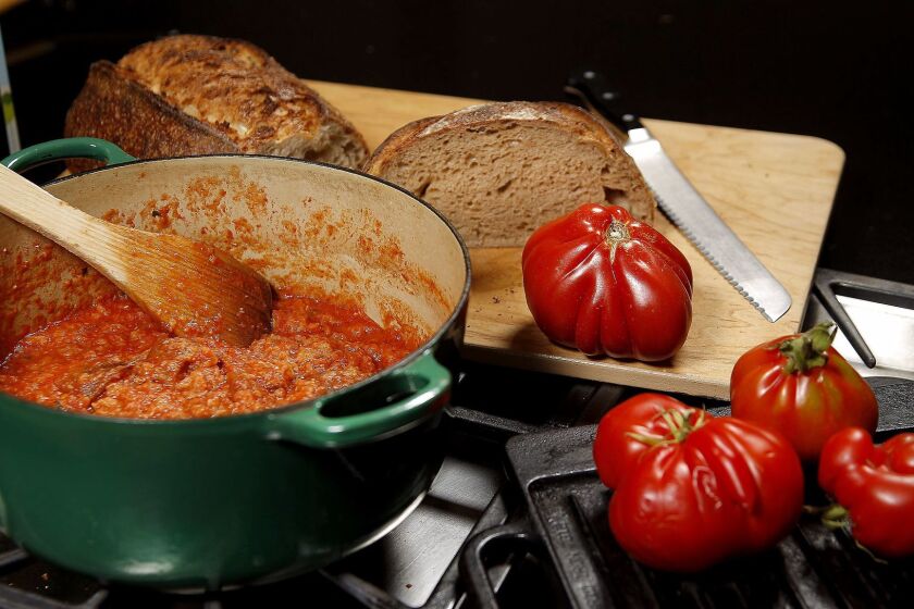 LOS ANGELES, CA., JUNE 21, 2017-- A recipe Pappa al Pomodoro (a thick Italian tomato sauce) for Evan Kleiman's latest Italian Cooking column. The process and finished dish are photographed in the kitchen. (photo by Kirk McKoy / LOS ANGELES TIMES)
