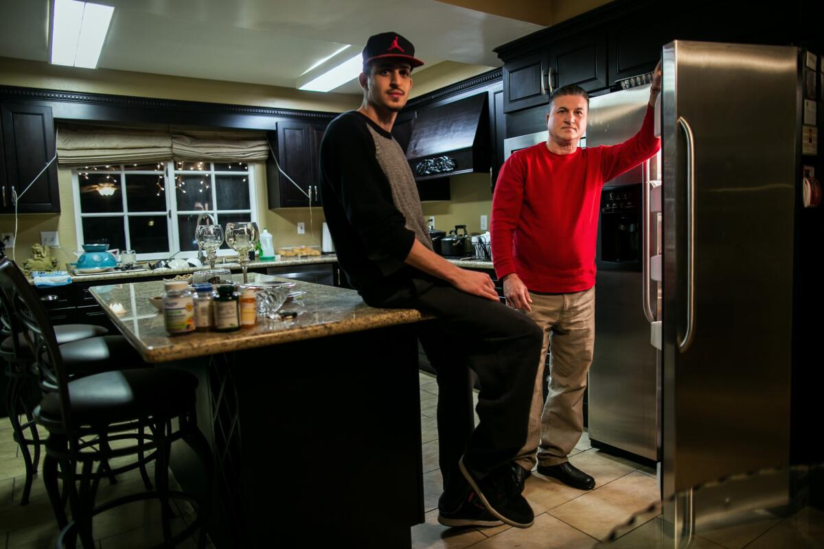 Johnny Pambakian and his son Justin in their newly remodeled kitchen in Porter Ranch.