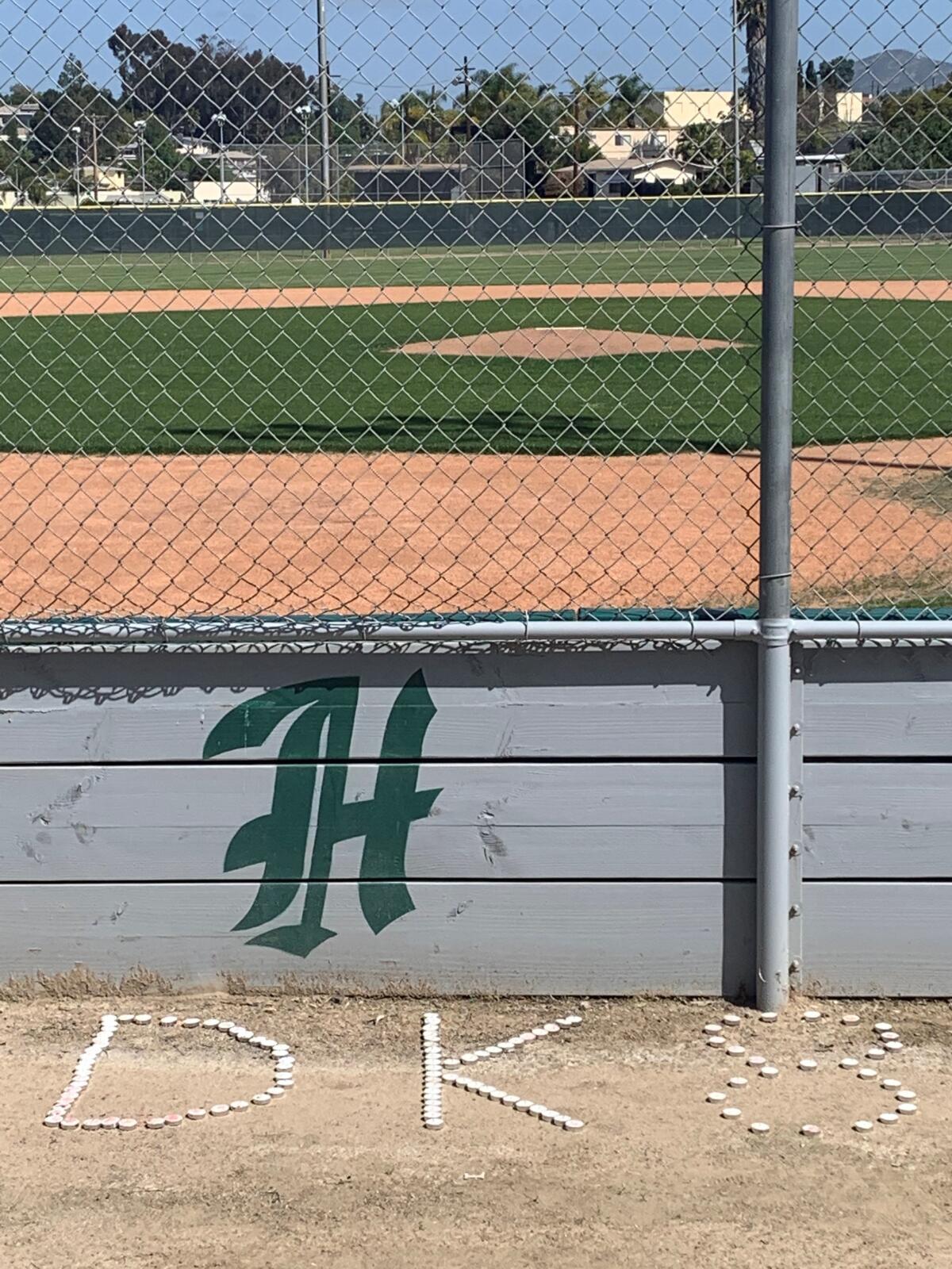 A memorial near the Helix High baseball field honors the memory of former Highlanders player Dylan King.