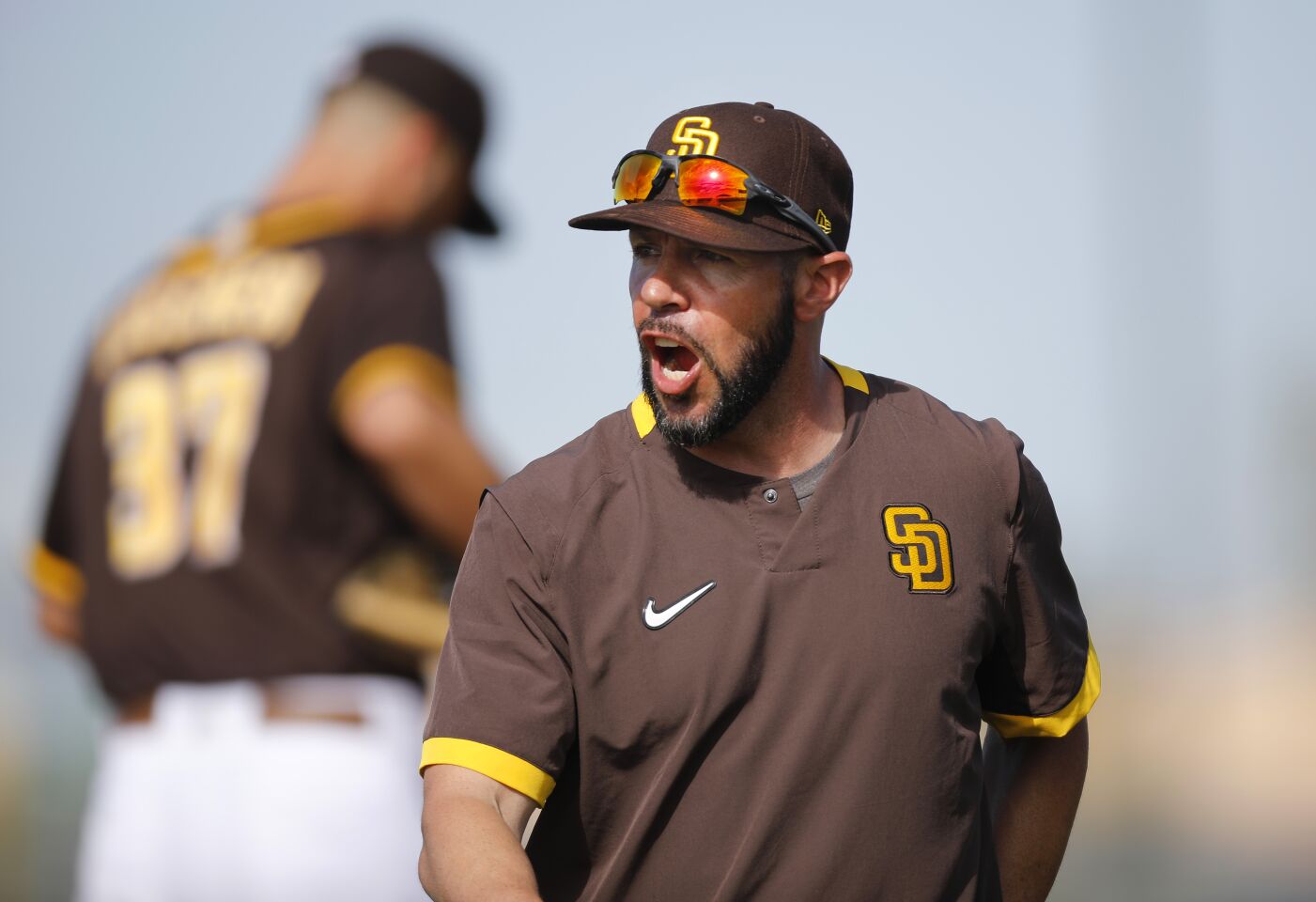 San Diego Padres Jayce Tingler gives some instruction during a spring training practice on Feb. 19, 2020.
