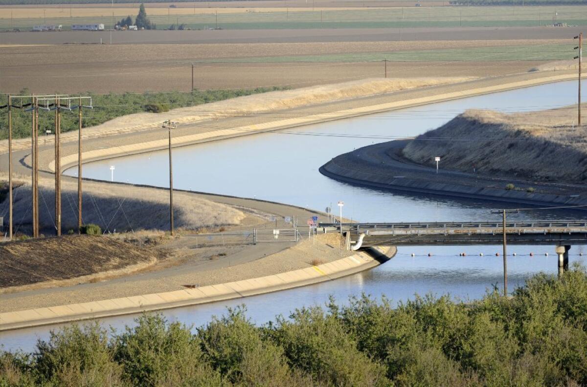 A canal in the Central Valley carries water to Southern California. There are currently three bills under consideration in the state Legislature to put a multibillion-dollar water bond measure on the ballot.