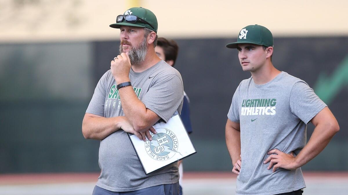 Coach BJ Crabtree, pictured on the left at Sage Hill School on Aug. 9, guided the Lightning to the Express League 8-man football title with a 28-12 victory over Downey Calvary Chapel on Saturday.