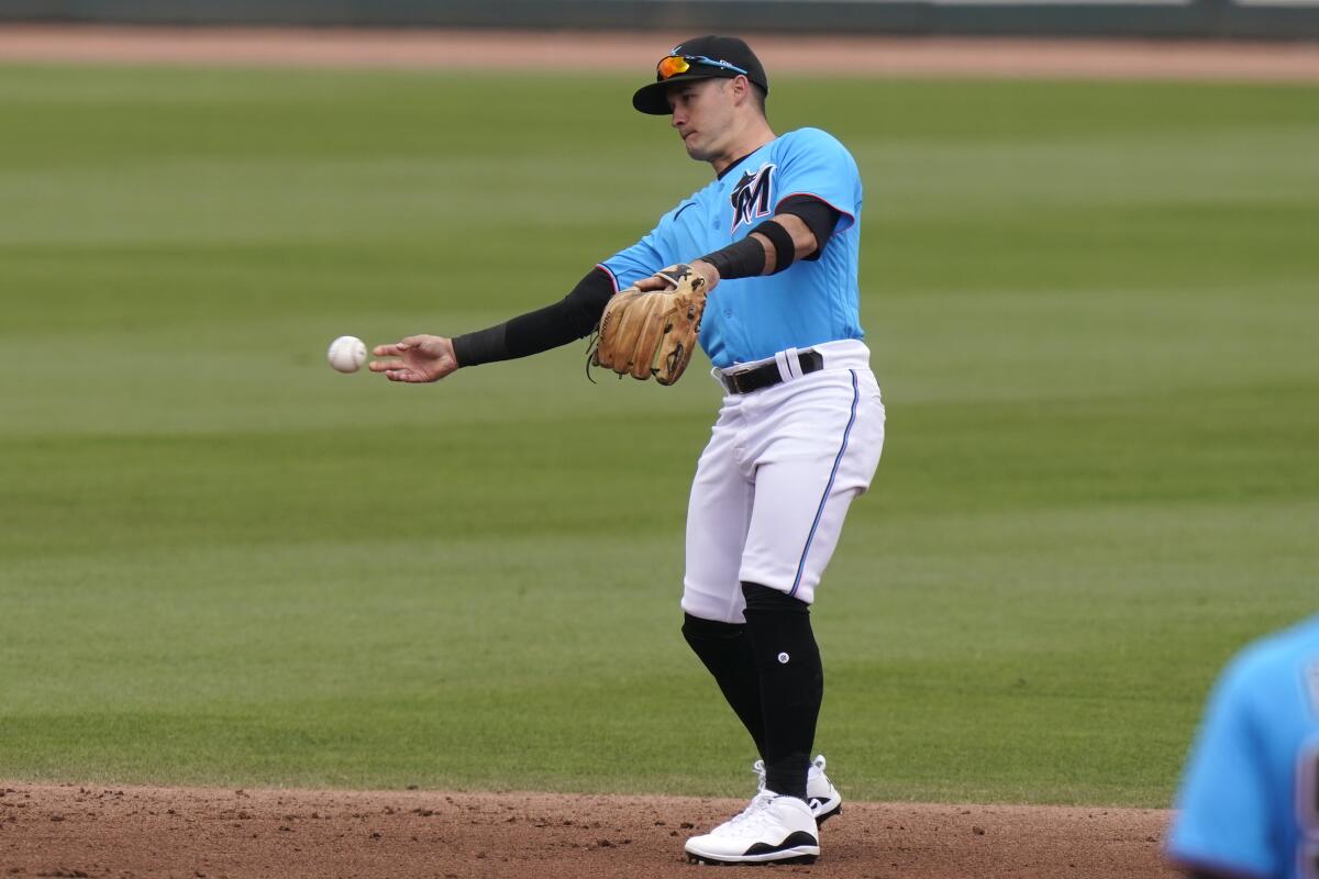 Miami Marlins shortstop Eddy Alvarez warms up during a spring training game.