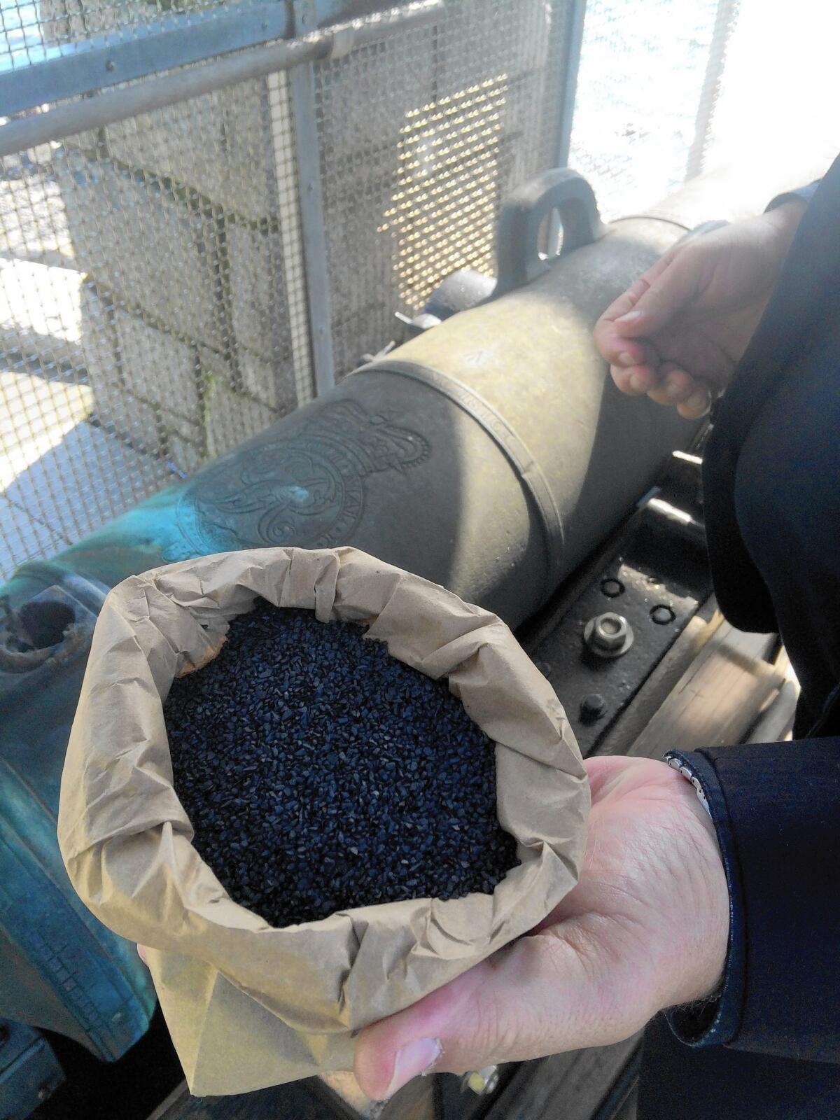The Vancouver cannon firing calls for a paper sack containing a pound and a half of gunpowder, which is placed in the cannon barrel and lighted with an electronic match connected to a timer.