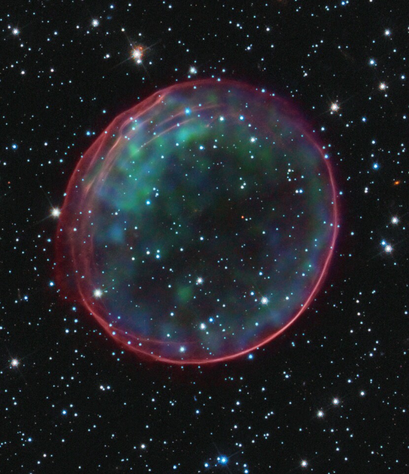 The image of this supernova remnant was made by combining data taken with the Hubble Space Telescope and X-ray images from the Chandra X-ray Observatory.