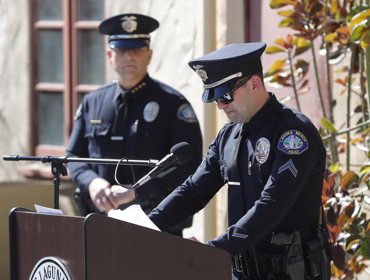 Corporal Zachary Fillers, right, of the Laguna Beach Police Department shares memories of K9 officer Ranger.