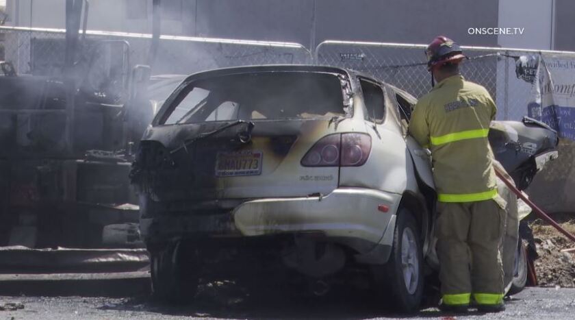 A person died after slamming a Lexus into three vehicles at a construction site on East Washington Avenue in El Cajon on Tuesday afternoon, police said. Witnesses reported hearing an explosion. Fire crews arrived to find four vehicles on fire.