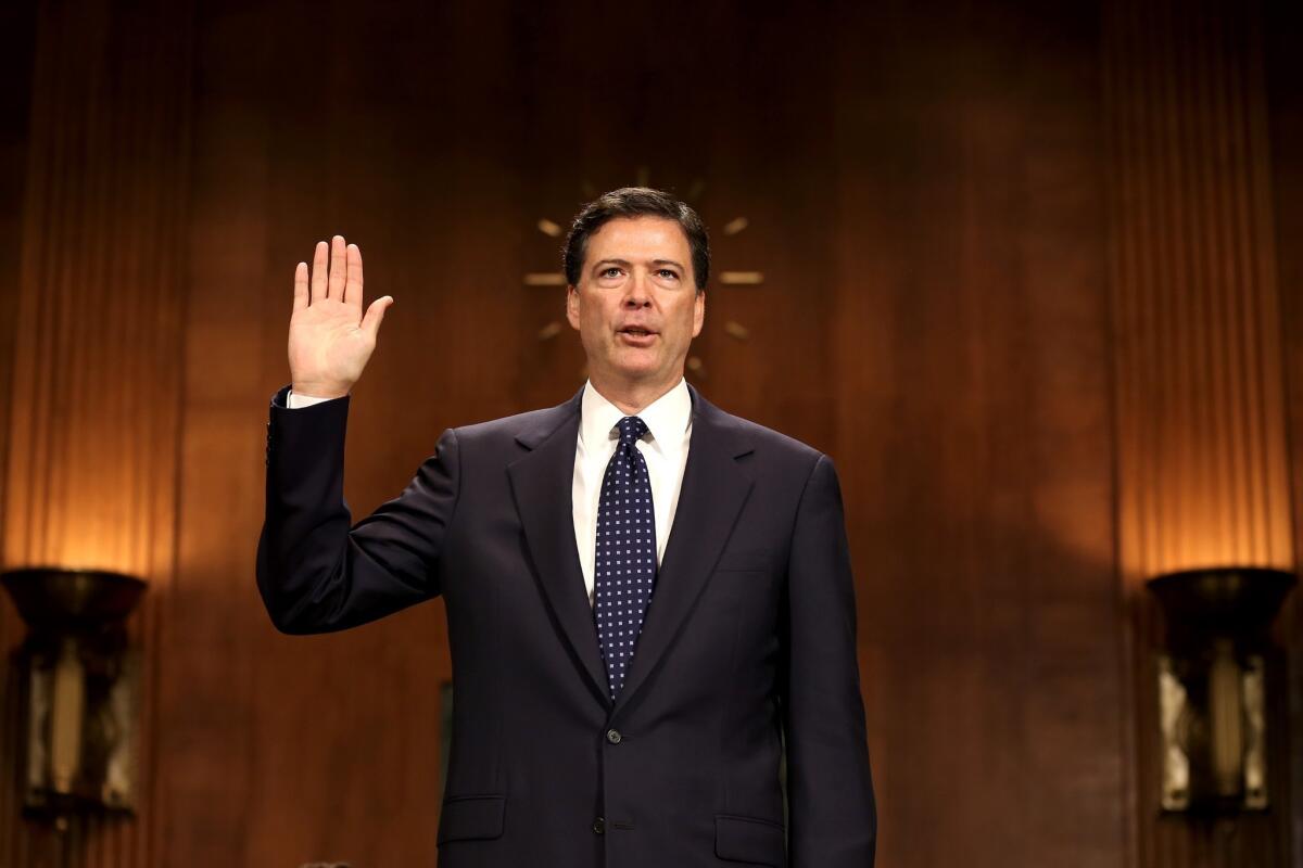 James Comey Jr., nominee to be director of the Federal Bureau of Investigation, is sworn in for his Senate Judiciary Committee confirmation hearing on Capitol Hill. If confirmed, Mr. Comey will replace Robert Mueller III and become the eighth director of the FBI.