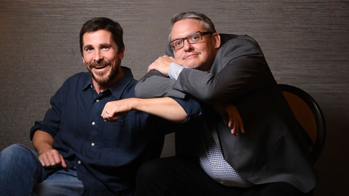 Christian Bale, left, and director Adam McKay of "Vice."