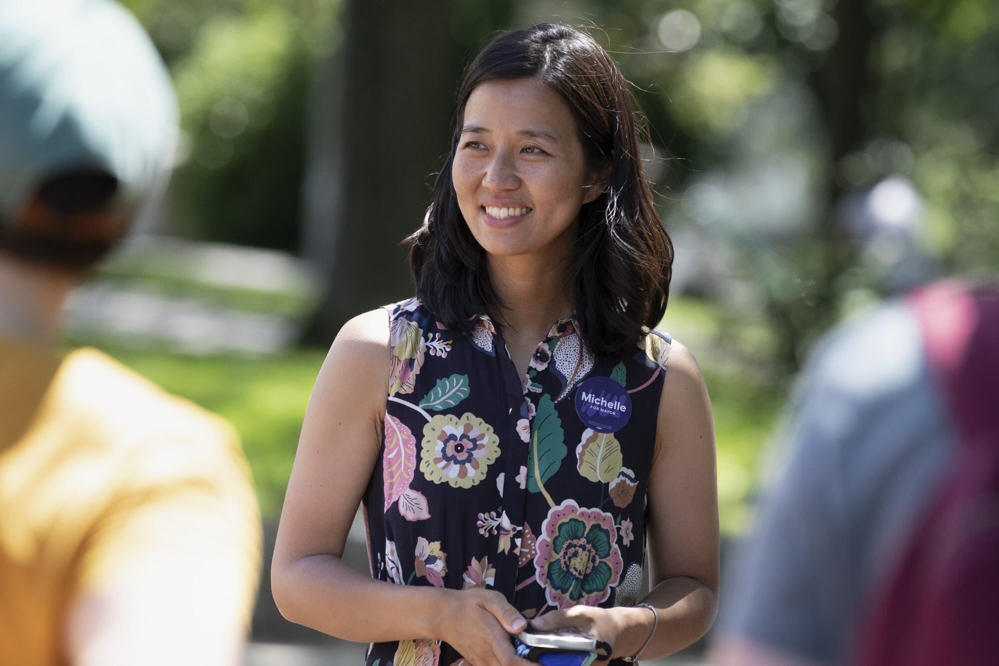 Boston mayoral candidate Michelle Wu speaks to volunteers at the launch of a canvassing campaign.