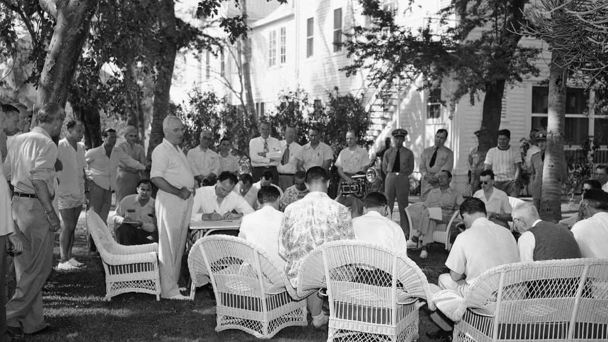 President Harry Truman holds a news conference in 1949 at the Little White House in Key West, Fla.