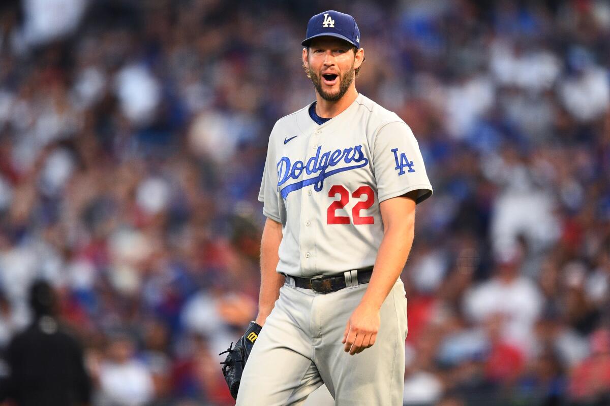 Dodgers pitcher Clayton Kershaw celebrates during Friday's game against the Angels.