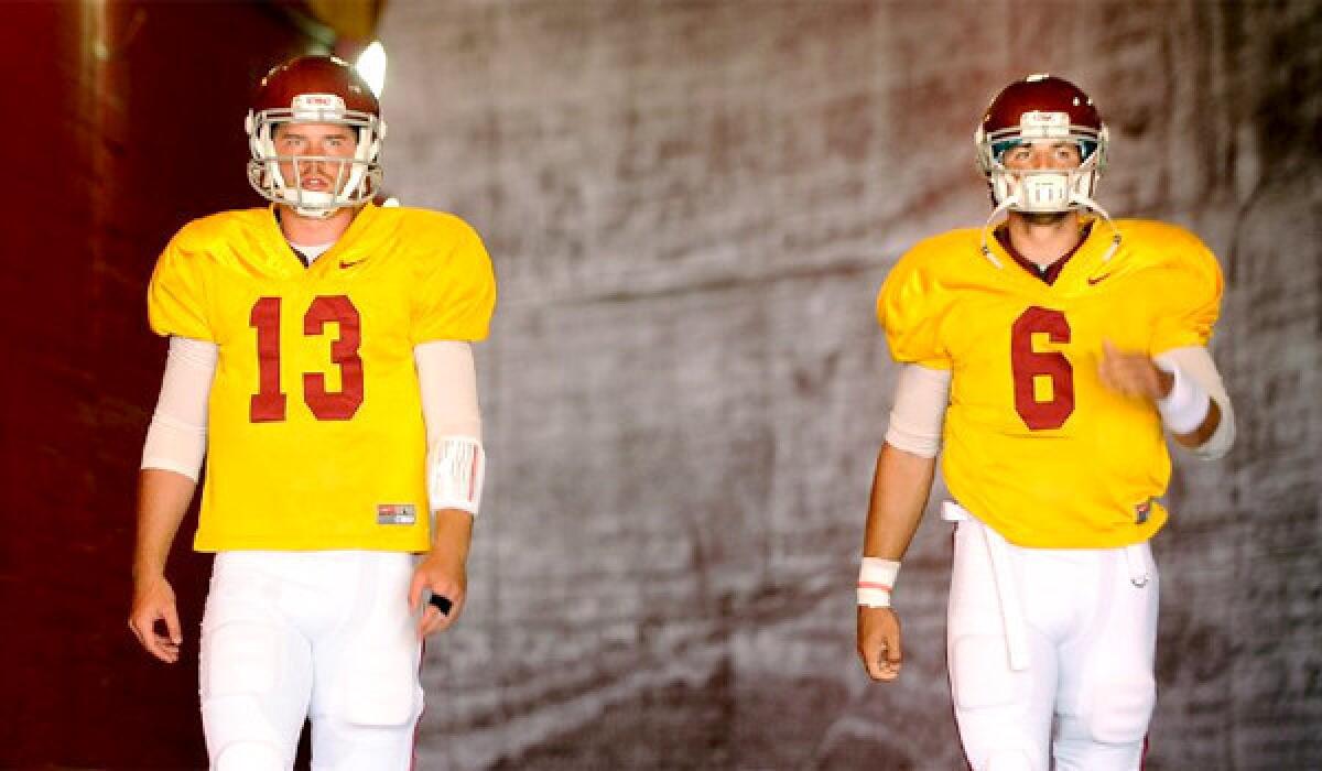 USC Coach Lane Kiffin still hasn't let whether it will be Max Wittek, left, or Cody Kessler, right, playing quarterback for the Trojans when they face Hawaii on Thursday.