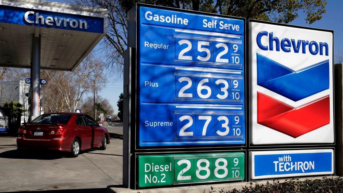 A Chevron gas station in Sacramento shows prices last year.