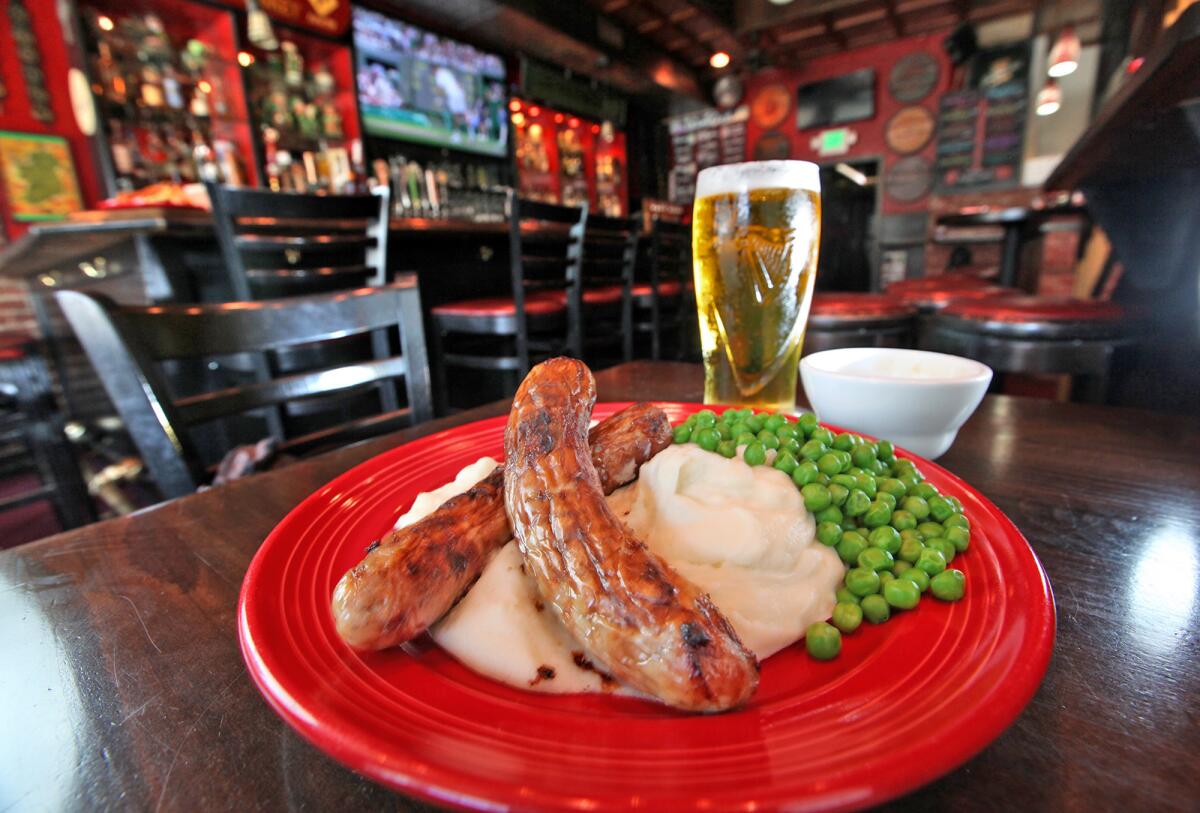 The bangers and mash plate at Timmy Nolan s Tavern and Grill is served with real English bangers.