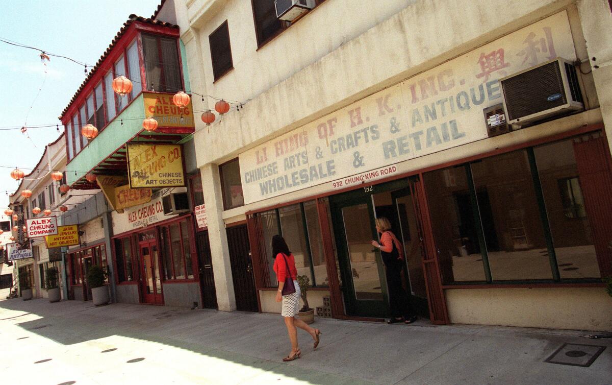 Gallery visitors leave Goldman Tevis on Chung King Road in 2000.