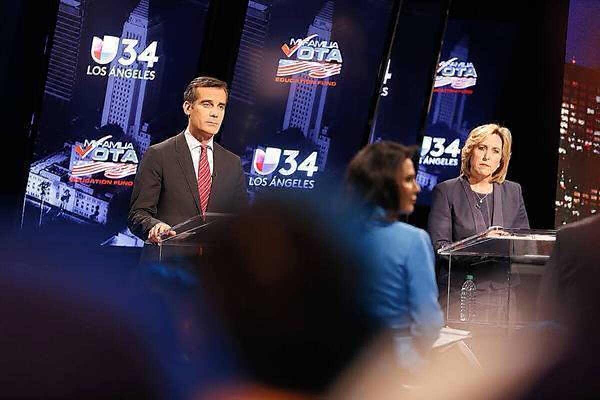 Los Angeles mayoral candidates Eric Garcetti and Wendy Greuel face off in a debate televised live from Spanish-language station KMEX.