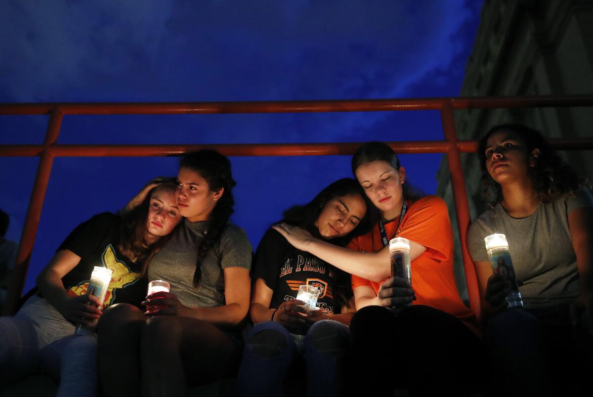 Mourners at a vigil 