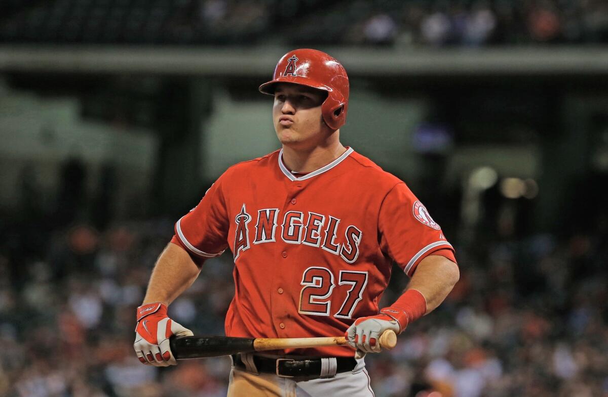 Mike Trout reacts after striking out in the seventh inning of the Angels' 8-5 loss Thursday to the Astros in Houston at Minute Maid Park.