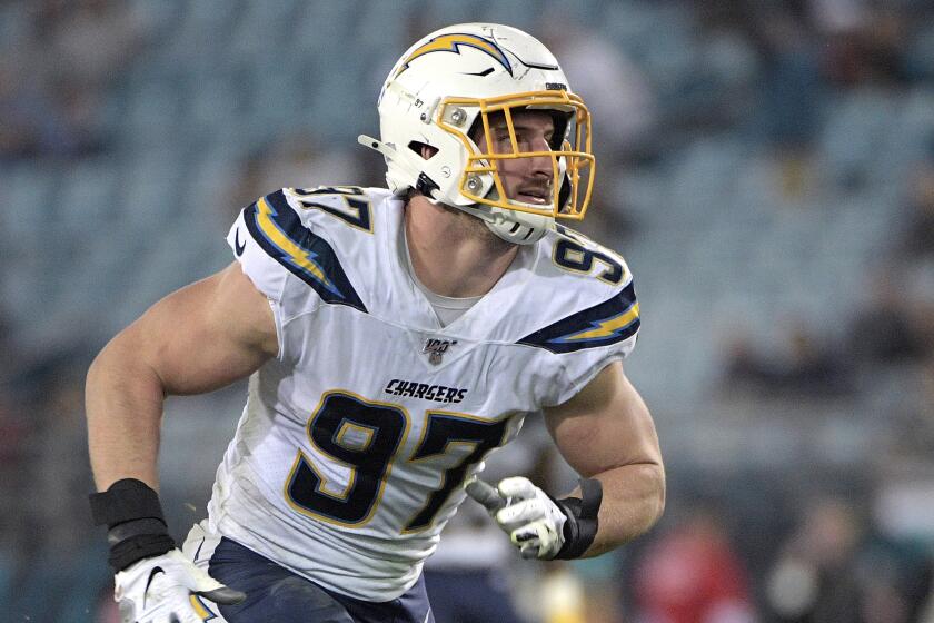 Los Angeles Chargers defensive end Joey Bosa (97) follows a play.