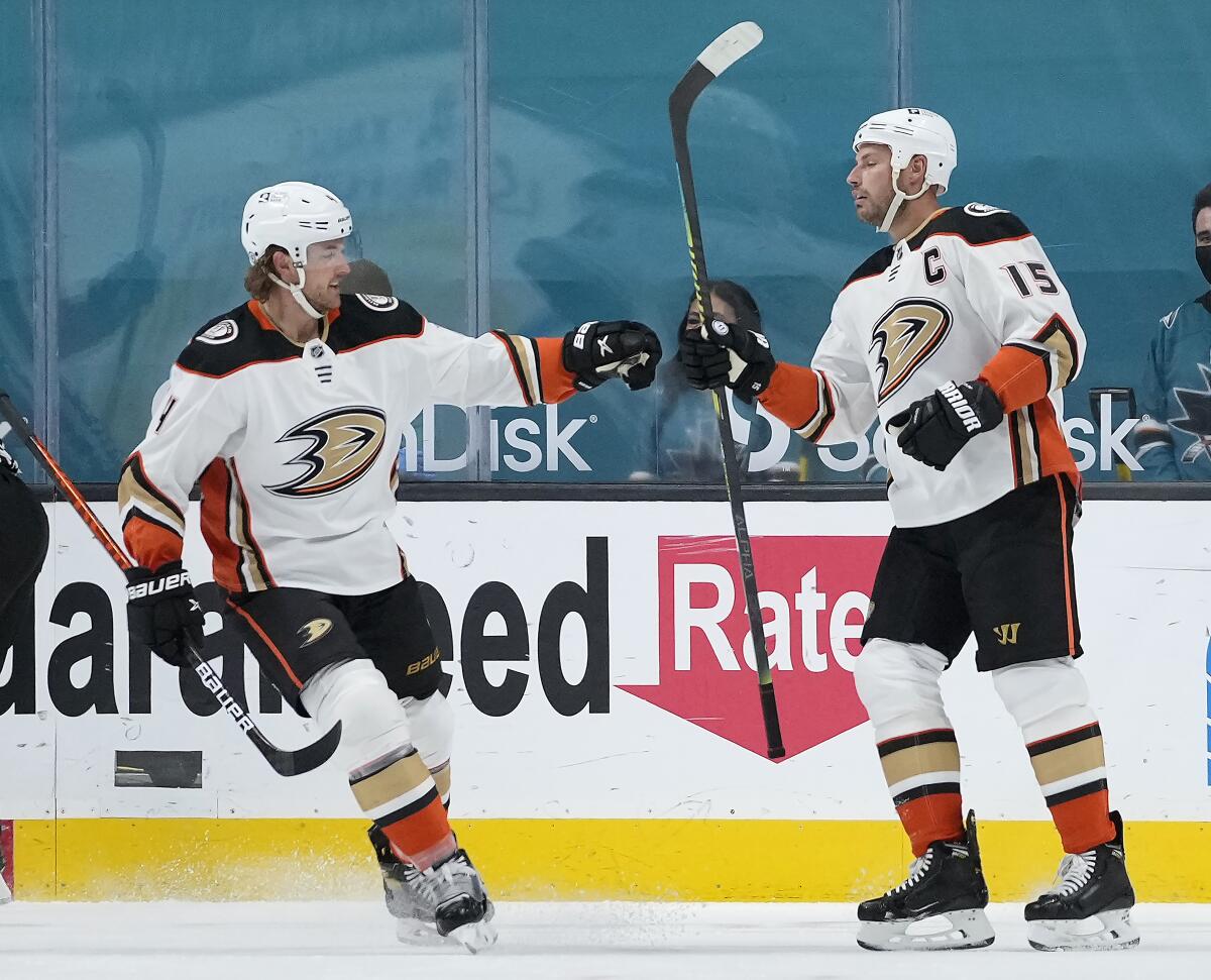 Anaheim Ducks center Ryan Getzlaf is congratulated by Cam Fowler after scoring a goal.