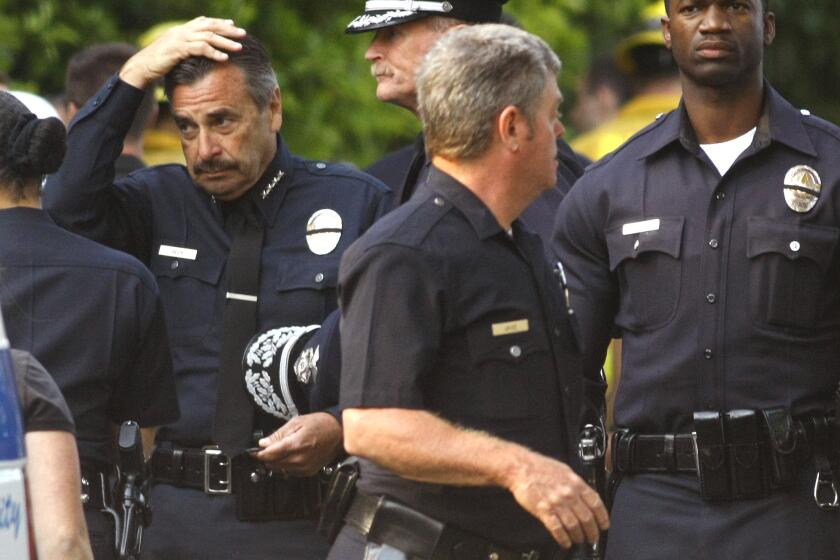 Los Angeles Police Department Chief Charlie Beck appears upset after an off-duty detective was killed in an accident with a cement truck Friday in the 1000 block of Loma Vista Drive in Beverly Hills.