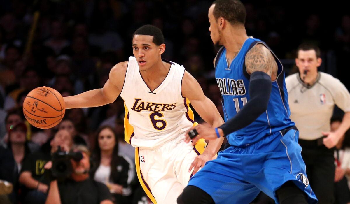 Lakers point guard Jordan Clarkson, who finished with 26 points, drives against Mavericks guard Monta Ellis during a 120-106 loss on Sunday night at Staples Center.