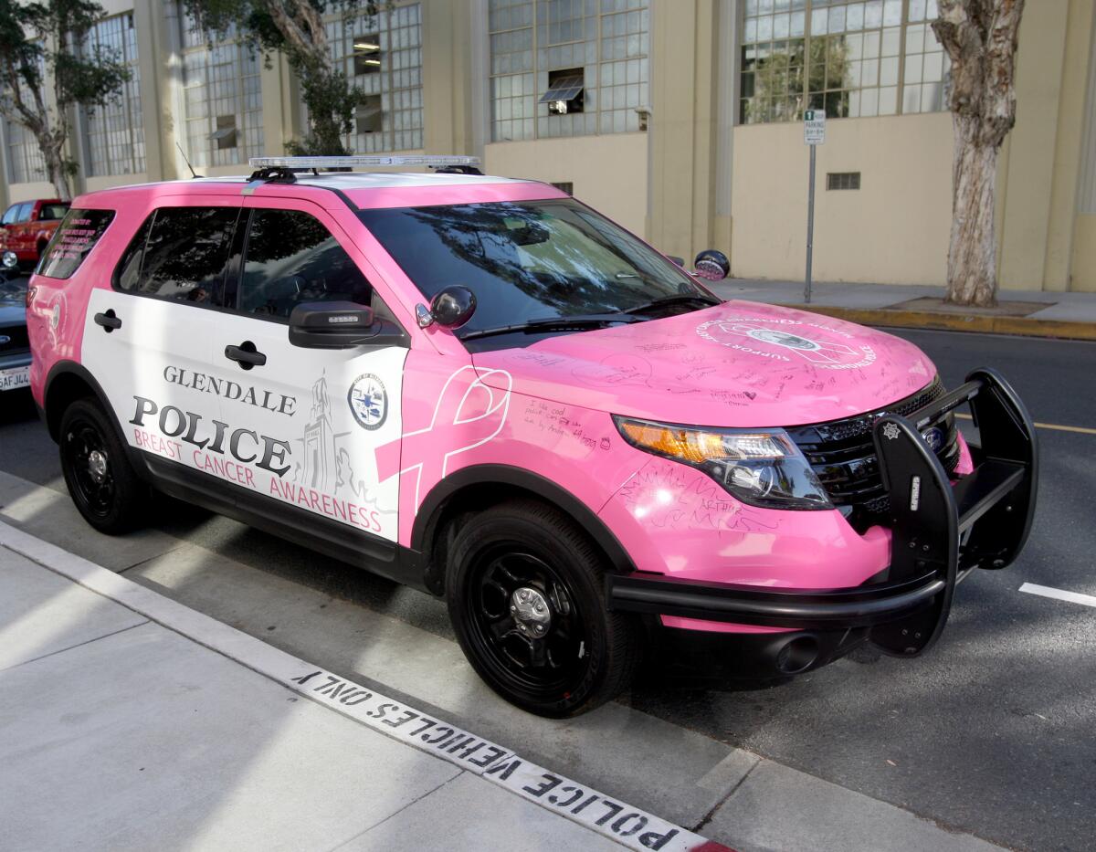A Glendale Police vehicle was decorated in pink for Breast Cancer Awareness month, in front of the police station in Glendale on Tuesday, October 3, 2015. The police vehicle will be displayed throughout the month of October in Glendale.