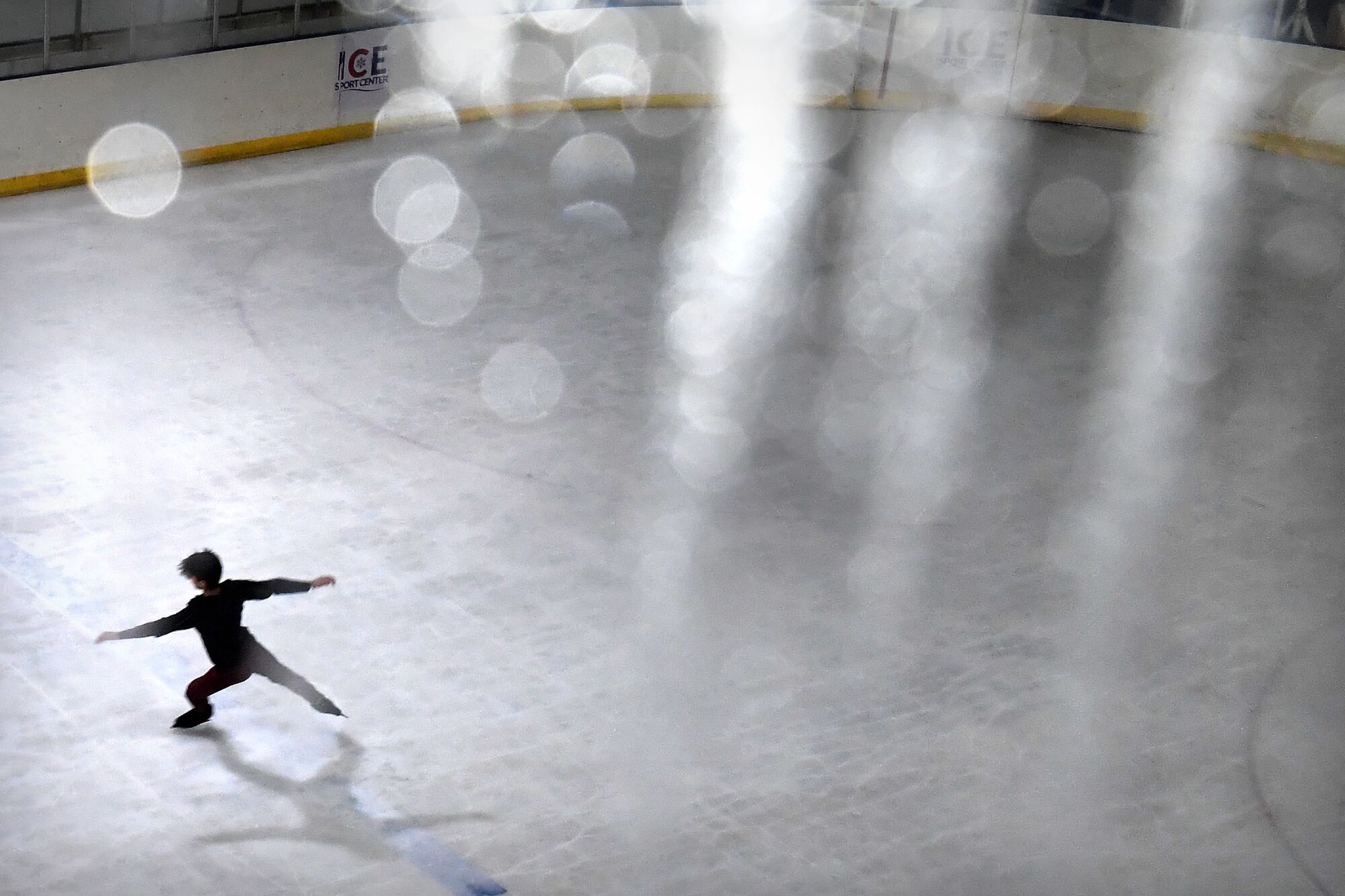Mexican figure skater Donovan Carrillo practices at an ice rink in a shopping mall.