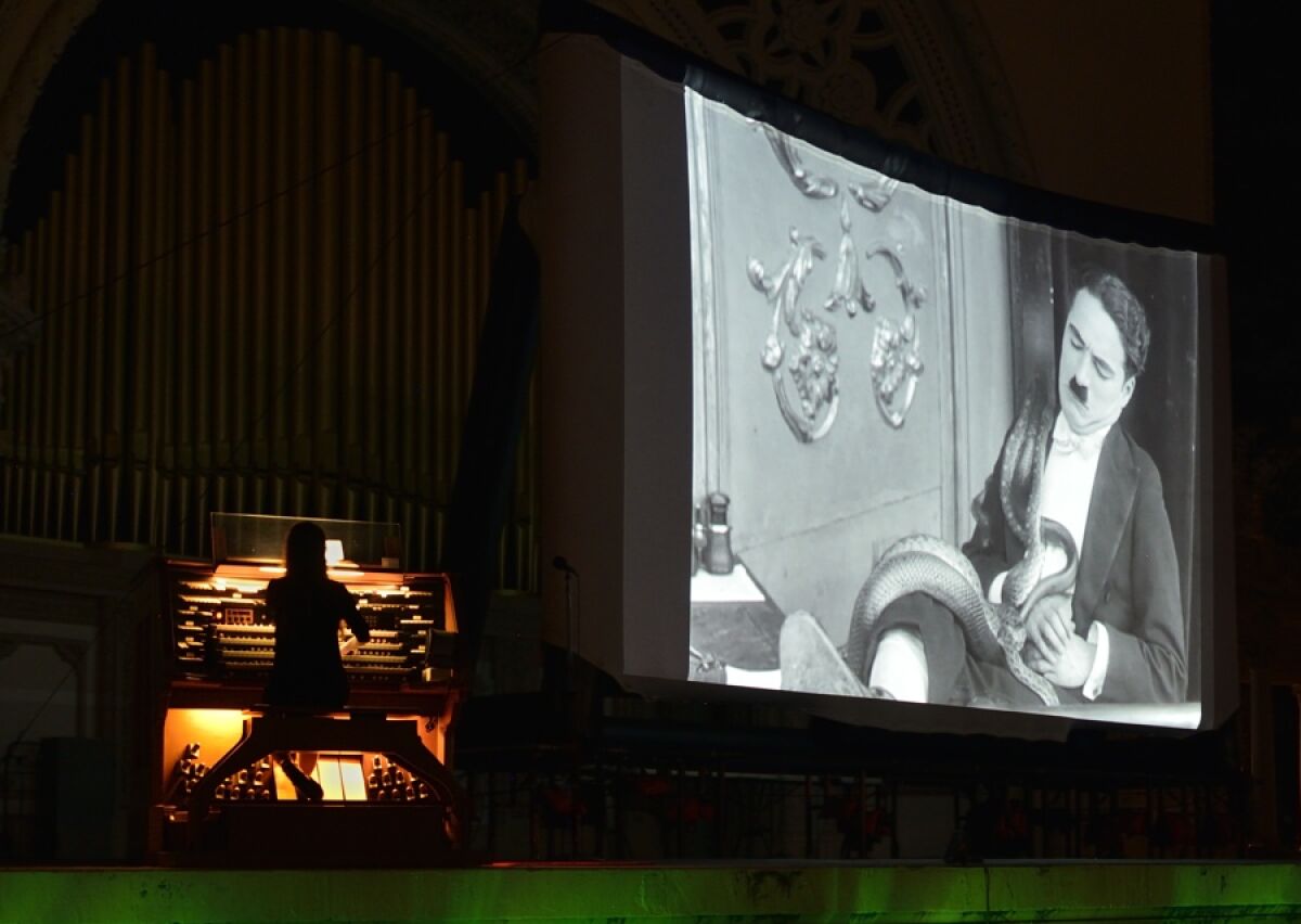 A silent film is accompanied by music on the Spreckels Pipe Organ.