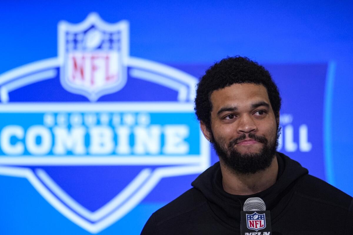 Quarterback Caleb Williams speaks during a news conference at the NFL scouting combine.