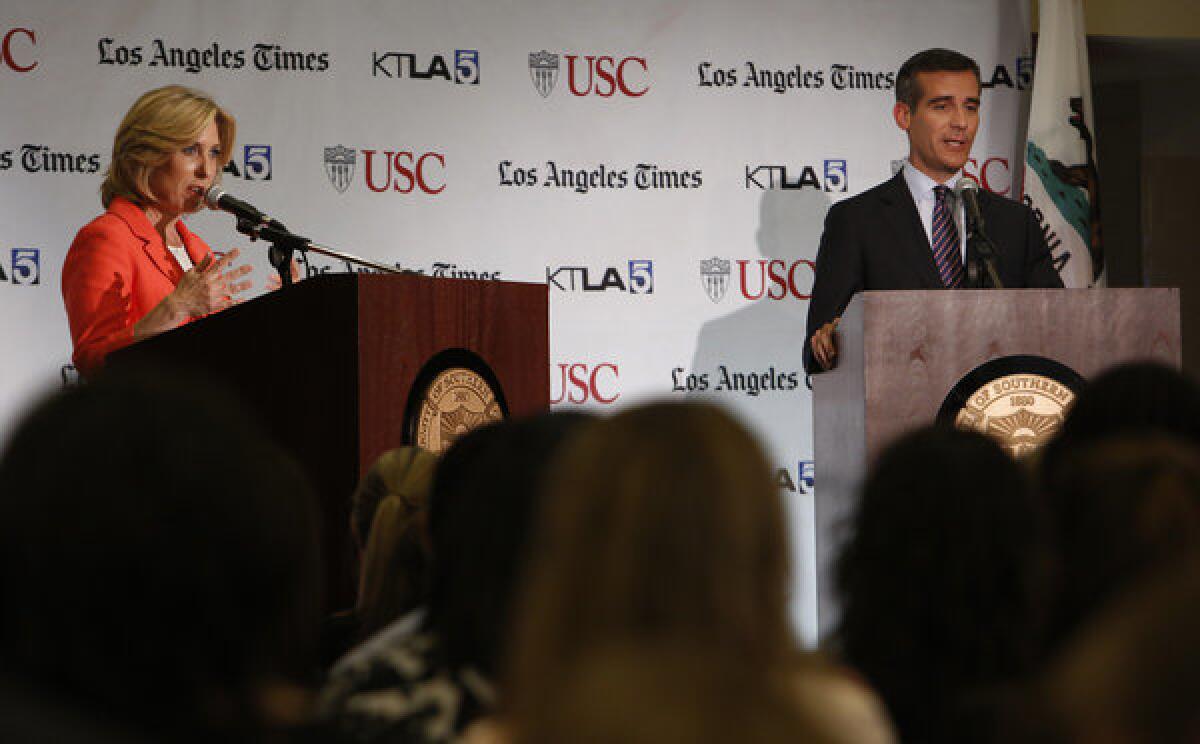 City Controller Wendy Greuel and City Councilman Eric Garcetti participate in a mayoral debate and town hall Monday night hosted by the USC Jesse M. Unruh Institute of Politics and the Los Angeles Times.
