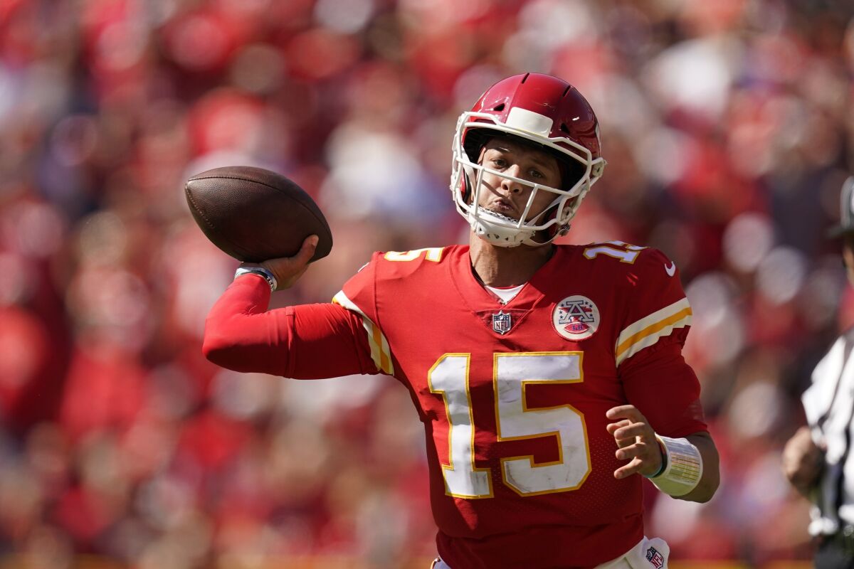 Chiefs quarterback Patrick Mahomes (15) throws against the Chargers on Sept. 26