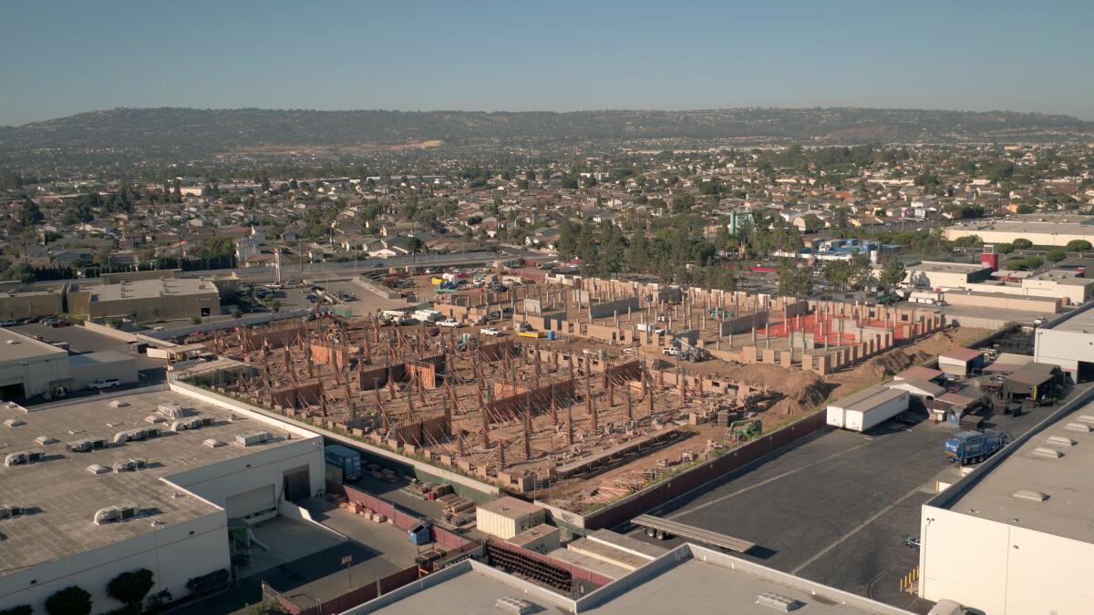 Aerial view of construction of Sea Breeze, a 352-unit apartment project in the Harbor Gateway area. The project is being built in an area zoned for industrial rather than residential use.