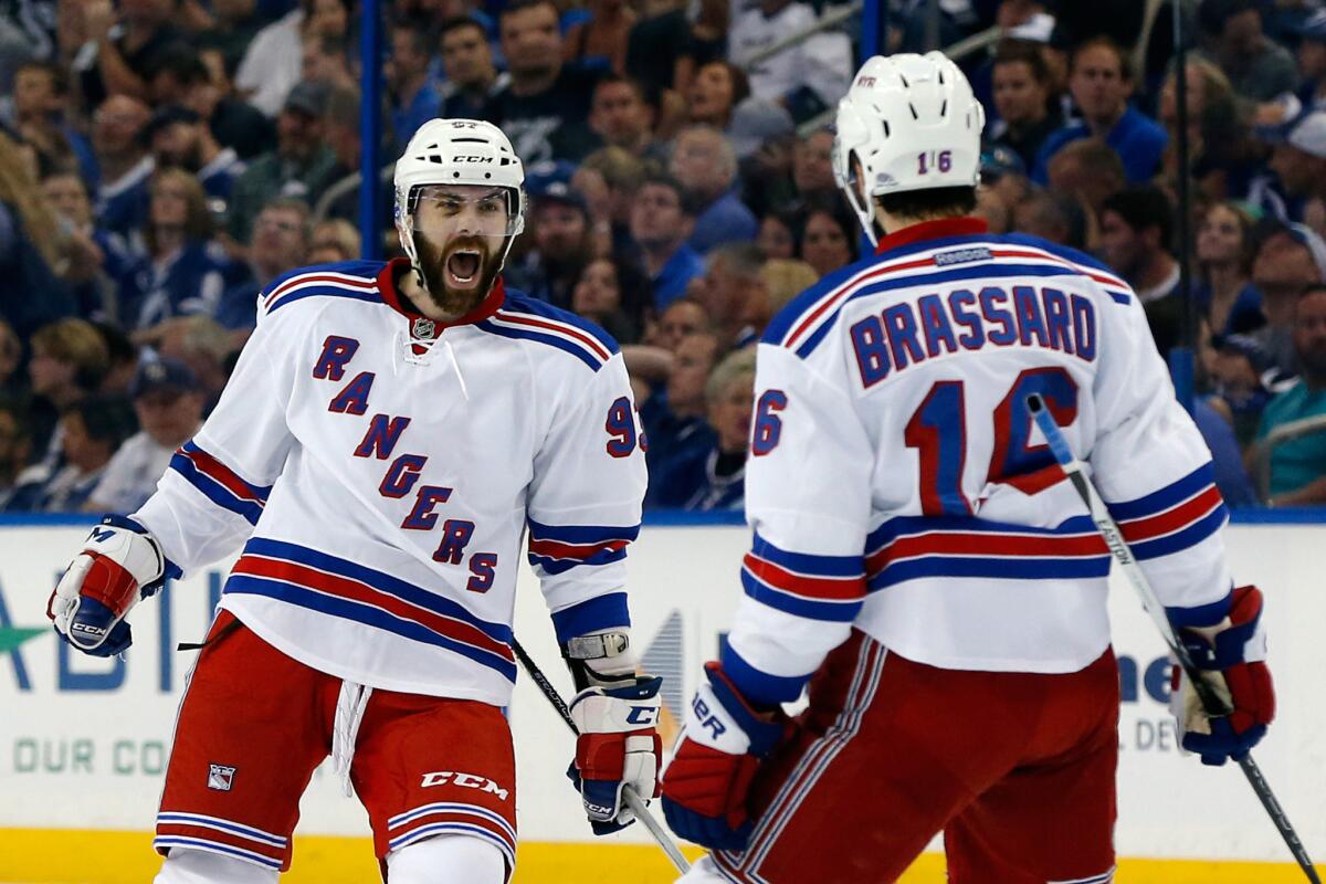 New York forward Derick Brassard celebrates with defenseman Keith Yandle after scoring a goal against the Tampa Bay Lightning in Game 6 of the Eastern Conference finals.