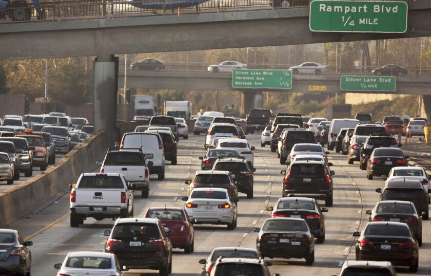FILE - This Dec. 12, 2018, file photo shows traffic on the Hollywood Freeway in Los Angeles. The Trump administration is signaling that it could increase fuel economy standards, possibly compromising on its push to freeze them at 2020 levels. In one of the administration's hardest-fought battles to roll back Obama-era environmental regulations, two federal agencies submitted a final rule on gas mileage and greenhouse gas emissions on Tuesday, Jan. 14, 2020. (AP Photo/Damian Dovarganes, File)