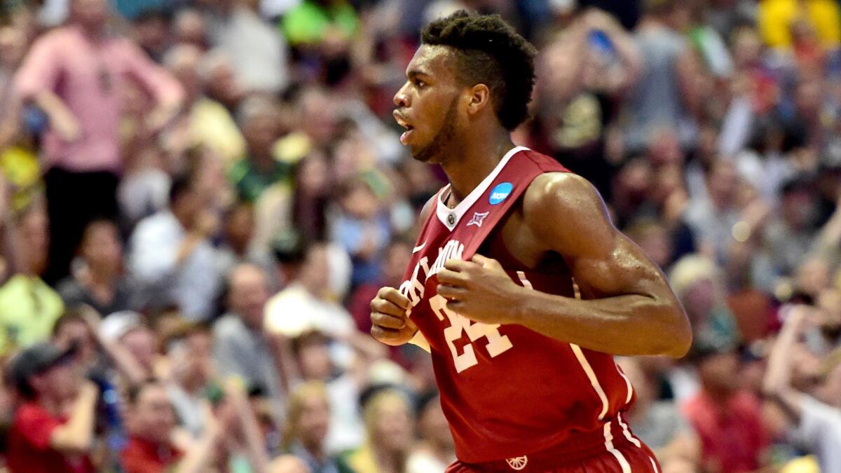 Oklahoma guard Buddy Hield reacts after scoring against Oregon in the first half of the West Regional final.