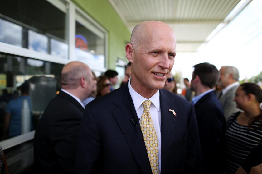 Florida Gov.Rick Scott is planning a trip to California next month in an attempt to persuade shipping companies to use ports in his home state.