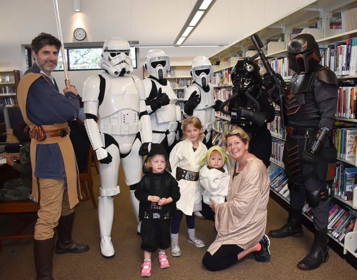 Lucy Beard and her children, Maisie, 3; Ellie, 6; and Geoffrey, 1; wore “Star Wars” costumes.