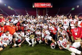 LOS ANGELES, CA - NOVEMBER 24, 2023: Mater Dei celebrates its 35-7 win over St John Bosco to win the Southern Section Division I football championship at the LA Memorial Coliseum on November 24, 2023 in Los Angeles, California.(Gina Ferazzi / Los Angeles Times)