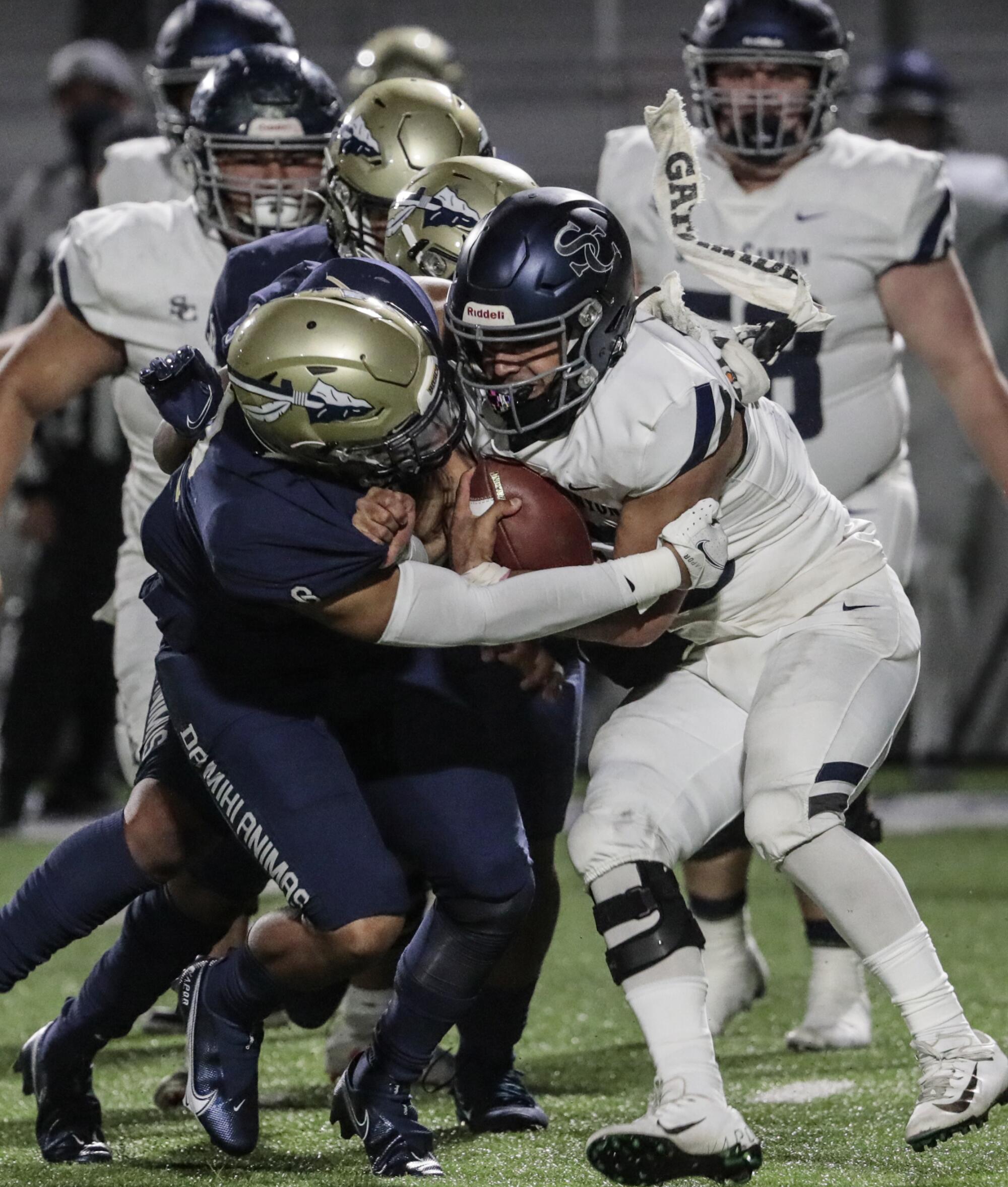 St. John Bosco linebacker Andrew Simpson sacks Sierra Canyon quarterback Daniel Duran in the first half.